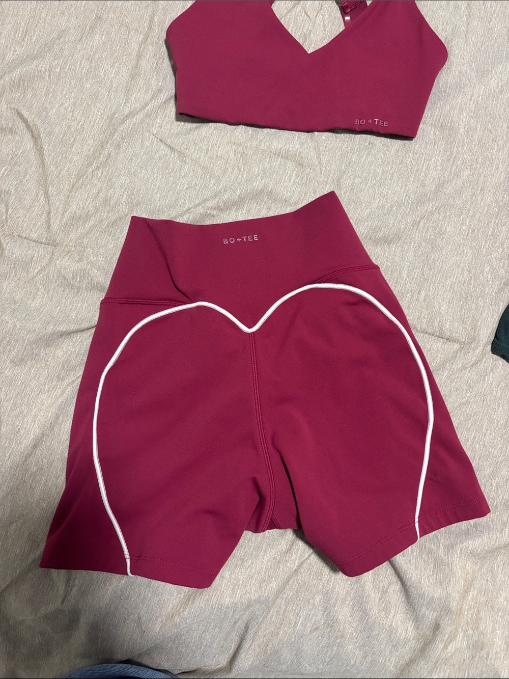 Bo+Tee Women's Magenta Strappy Sports Bra and High-Waist Shorts Set - Picture 2 of 3